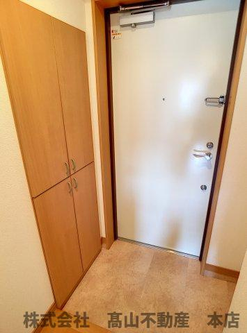 宗像市赤間駅前１丁目の賃貸マンションの玄関