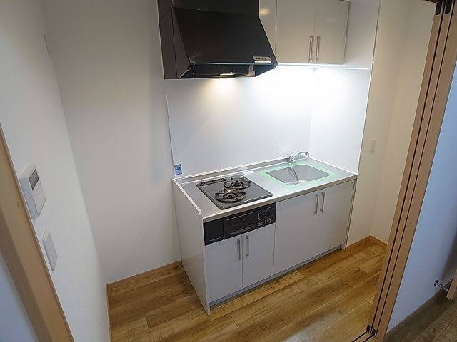 M’sレジデンス神戸のキッチン|システムキッチン、2口グリル付き扉で隠せるタイプです