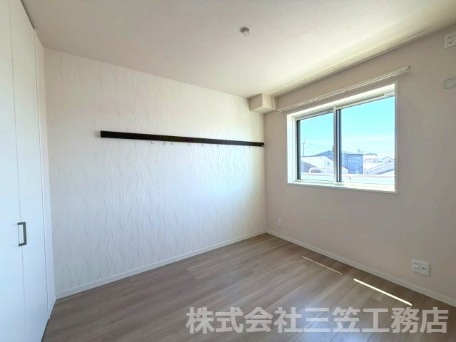 寝屋川市若葉町の賃貸マンションの寝室