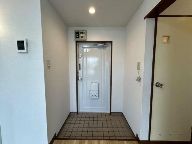 ベルエアー三ノ輪の玄関