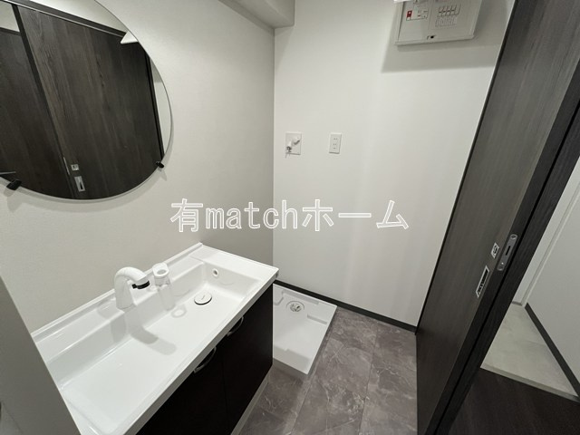 ブロード江坂広芝町レジデンスの洗面所|イメージとして同マンション反転タイプを表示しています