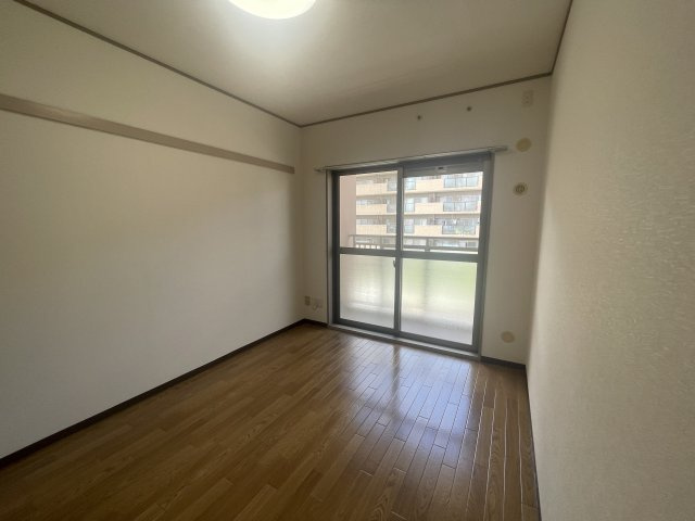 　東香里野村マンションの洋室