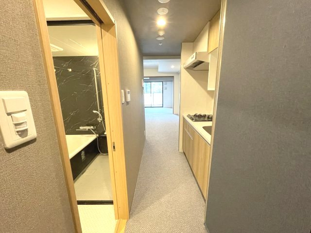 Uresidence Temmabashiの内装|同マンション反転タイプの部屋写真