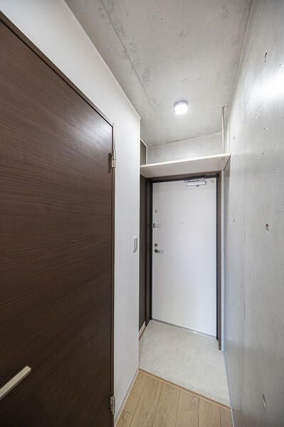 ＣＯＣＯＦＬＡＴ北千住Ｓｏｕｔｈの玄関
