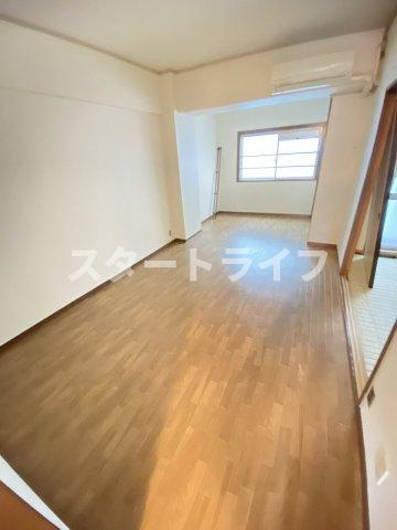 大阪市淀川区西宮原１丁目の賃貸マンションの居間・リビング