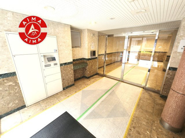 ダイナコートエスパシオアイトウのロビー|温かみのあるエントランスロビーです。