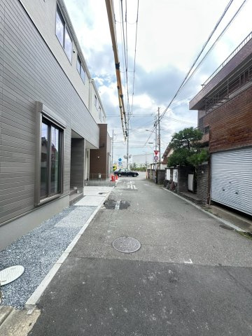 寝屋川市春日町　1号地の前面道路含む現地写真