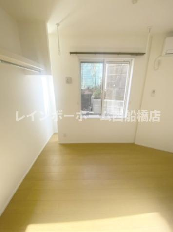 リベルテ村上の洋室