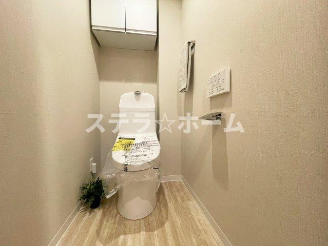 豊中緑ヶ丘サンハイツB棟のトイレ|落ち着いた色調のトイレです