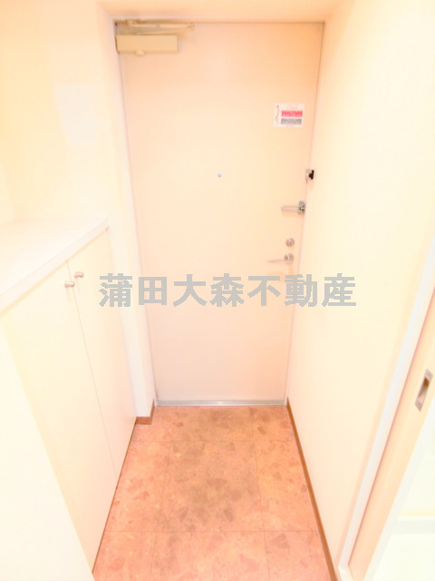 北糀谷コートの玄関
