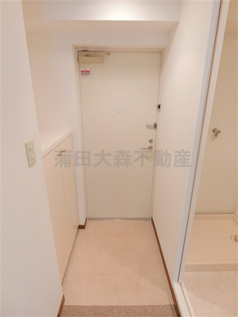 北糀谷コートの玄関