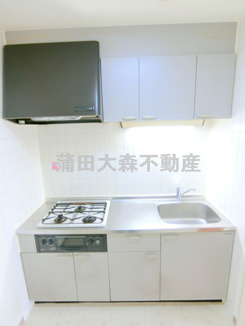 北糀谷コートのキッチン|3口ガスグリル付システムキッチン