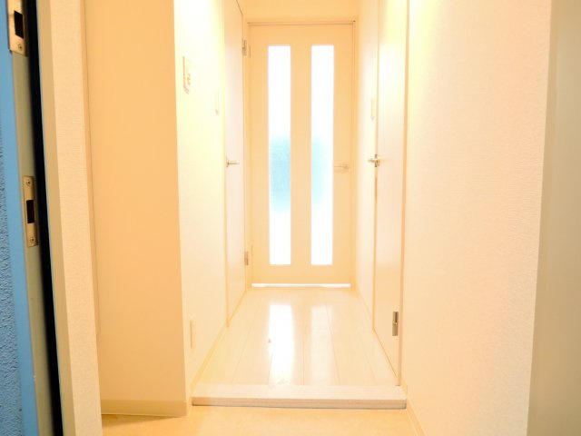 高槻市上牧南駅前町の賃貸マンションの玄関