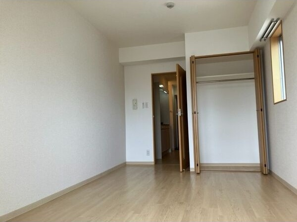 リアライズ沢下町Iの洋室