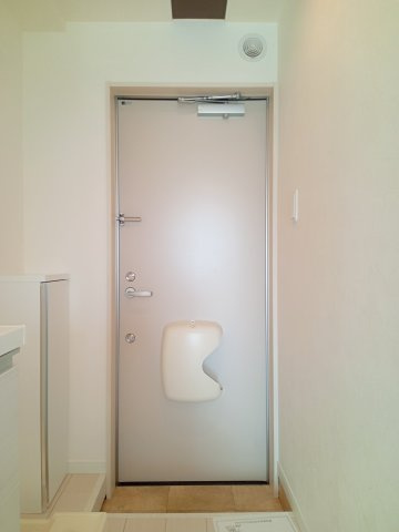 川崎市多摩区西生田５丁目のアパートの玄関