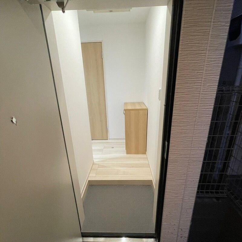 八千代市八千代台北１丁目のアパートの玄関