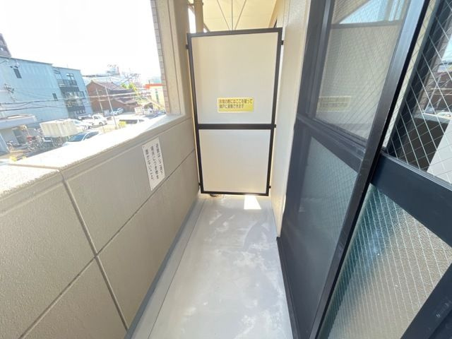 K．コオリナのバルコニー