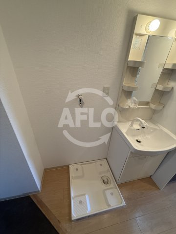 アップルガーデンコート城東の洗面所|アップルガーデンコート城東　室内洗濯機置場
