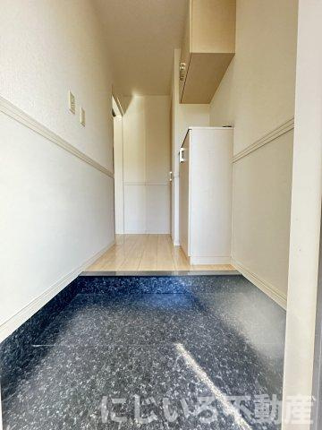 カネイコート日開野の玄関