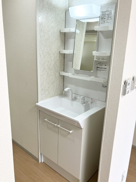 楠小路　A棟の洗面所|洗髪洗面化粧台
