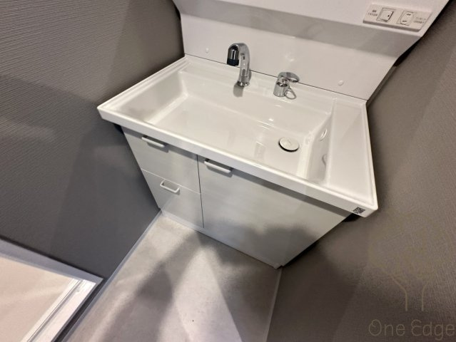 ファーストフィオーレ塚本ウェルビングの洗面所