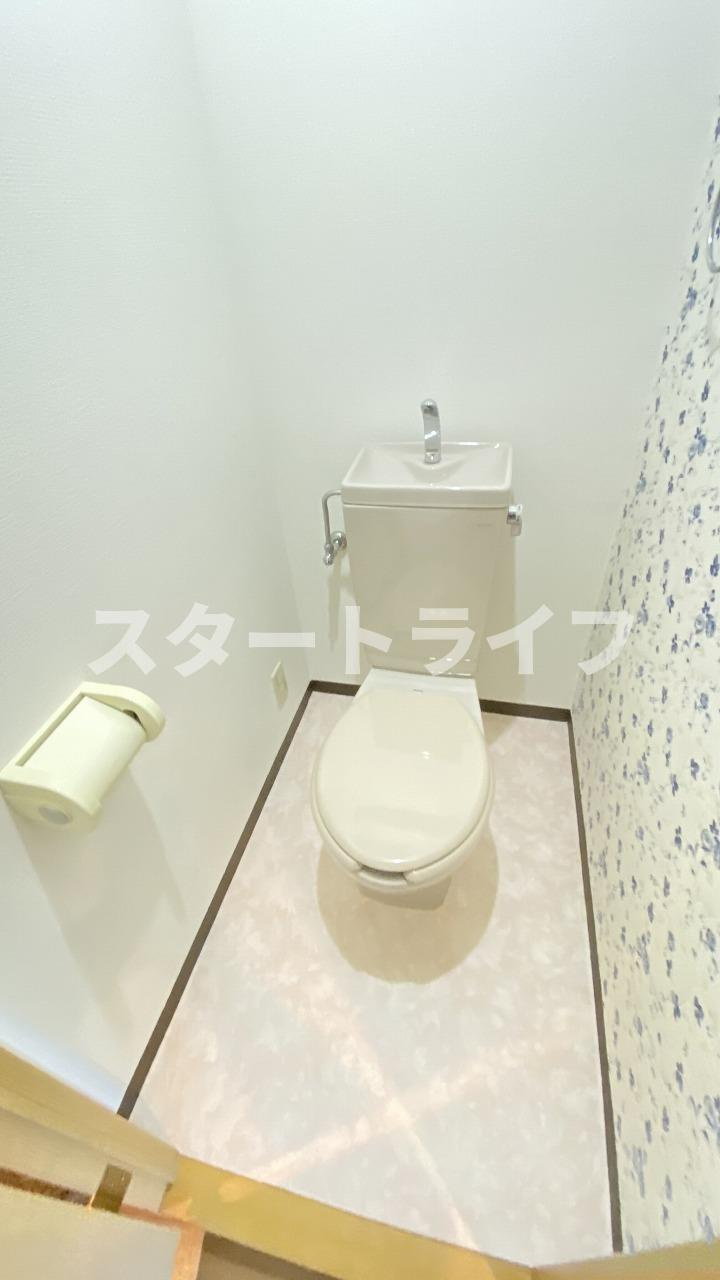 大阪市東淀川区西淡路１丁目の賃貸マンションのトイレ