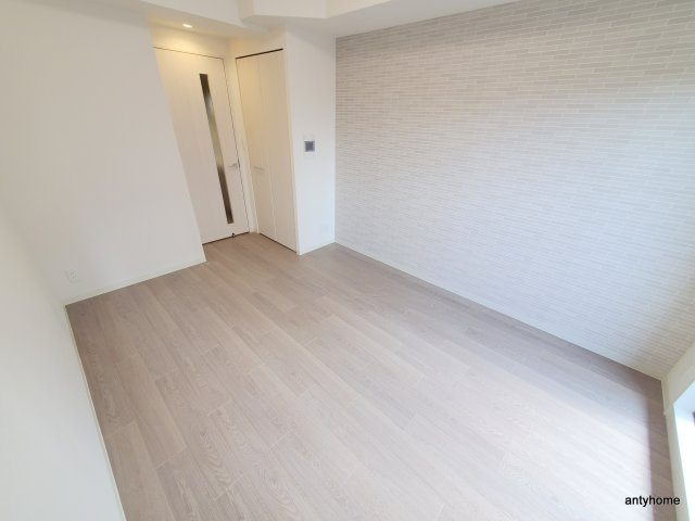 プレサンス大国町ラヴェニール　仲介手数料無料の寝室