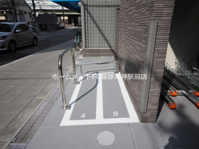 ミラージュパレス本町Departの駐車場
