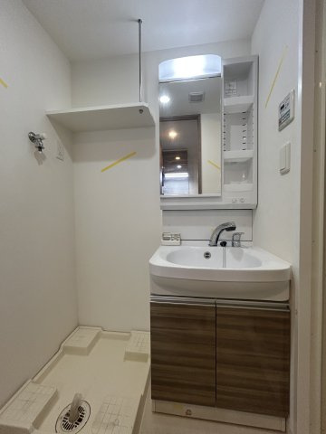 大阪市淀川区木川西３丁目の賃貸マンションの洗面所