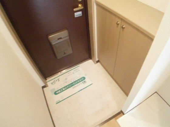 神戸市灘区弓木町５丁目の賃貸マンションの玄関