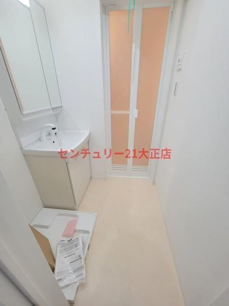新築賃貸長屋のエントランス|脱衣所
