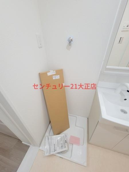 新築賃貸長屋の駐車場|室内洗濯機置場