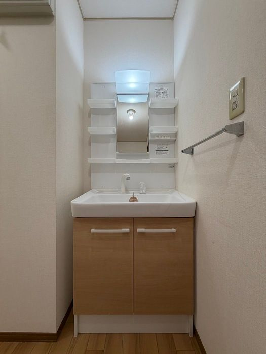 福井狐橋０戸建D-rooomの洗面所