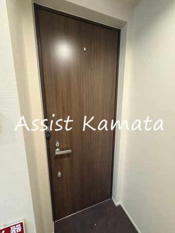 グランソレイユ大井の玄関