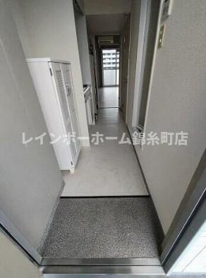 メゾン朋泉高砂の玄関