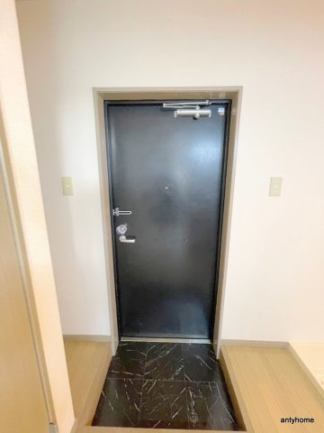 イーズ千里山　仲介手数料無料の玄関