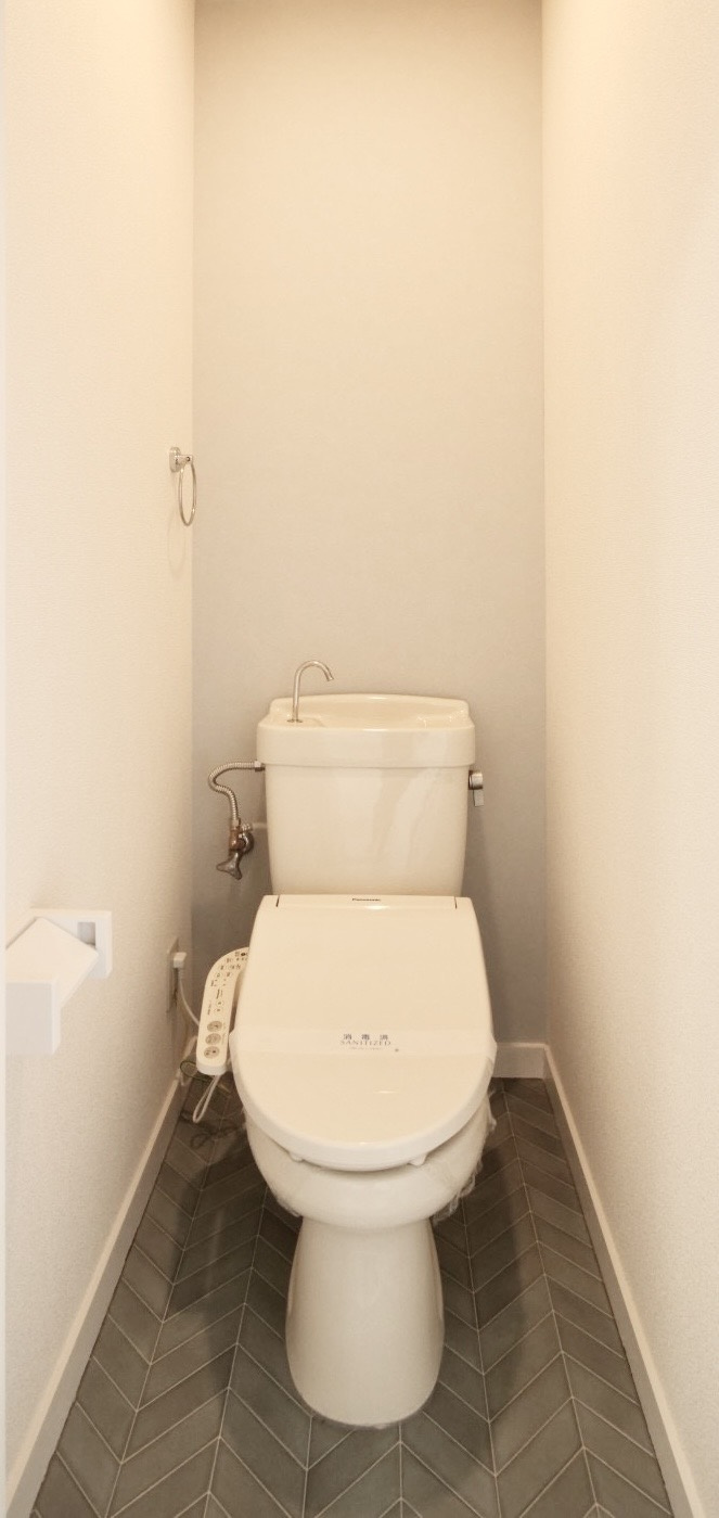 コーポラス小西　当新田のトイレ|※写真は別の部屋のものです。