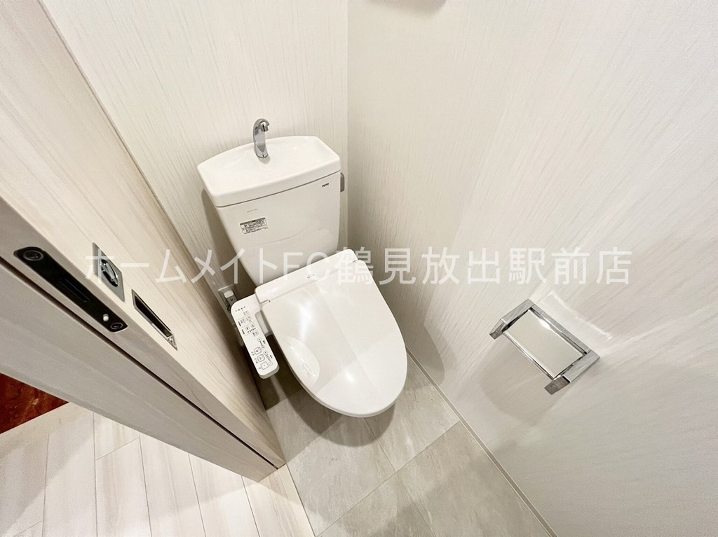 大阪市鶴見区鶴見４丁目の賃貸マンションのトイレ