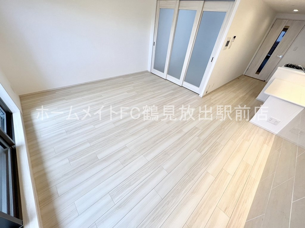 大阪市鶴見区鶴見４丁目の賃貸マンションの居間・リビング