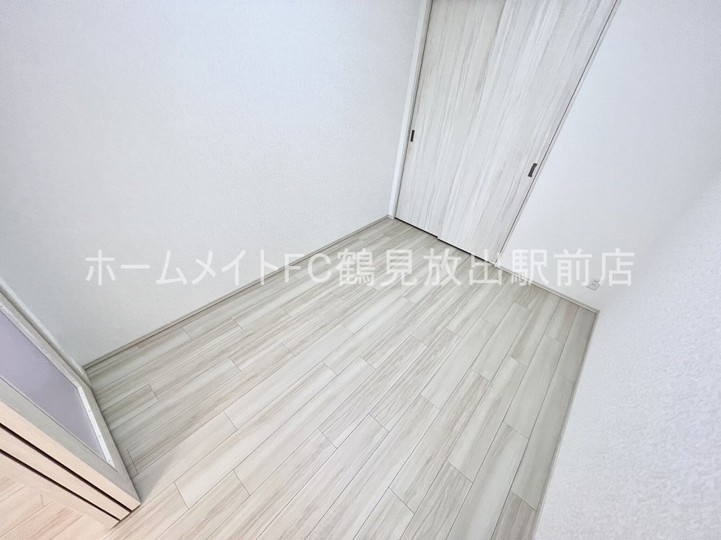 大阪市鶴見区鶴見４丁目の賃貸マンションの洋室