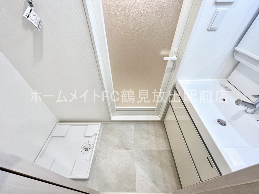 大阪市鶴見区鶴見４丁目の賃貸マンションの洗面所