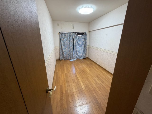 宗像市赤間 アンピール教育大前Ⅱ 中古マンションの洋室