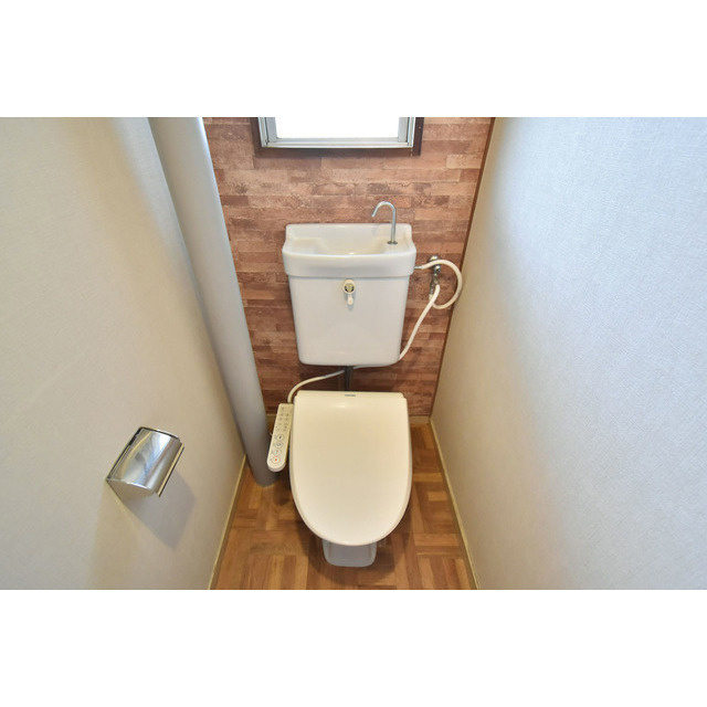 セキレイマンション久留米のトイレ|落ち着いた色調のトイレです