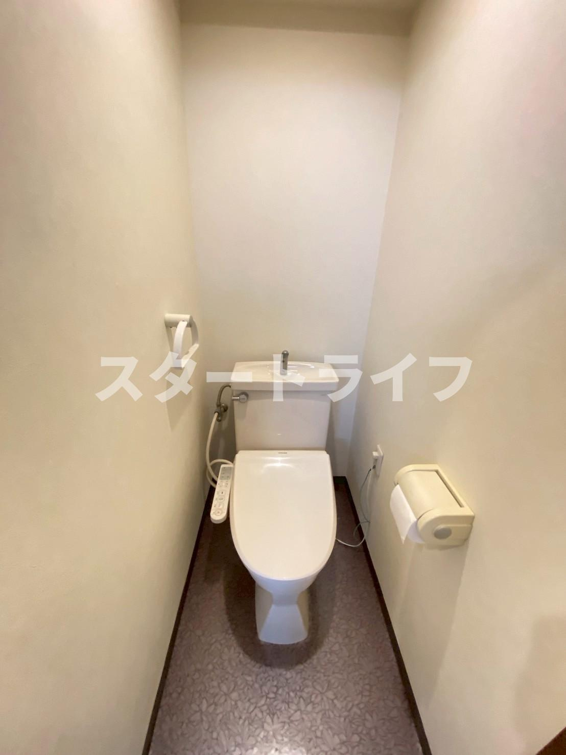大阪市淀川区十三東１丁目の賃貸マンションのトイレ