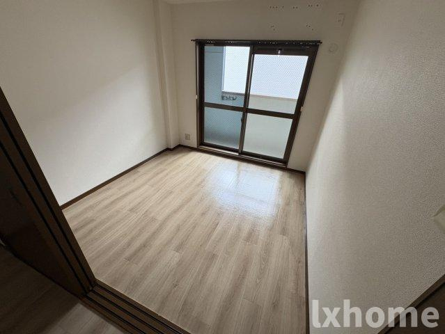 ドミールカメリアの寝室|落ち着いた色調の寝室です