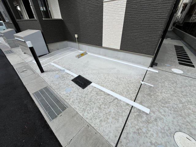 ジーメゾン寝屋川秦町アリビオの駐車場