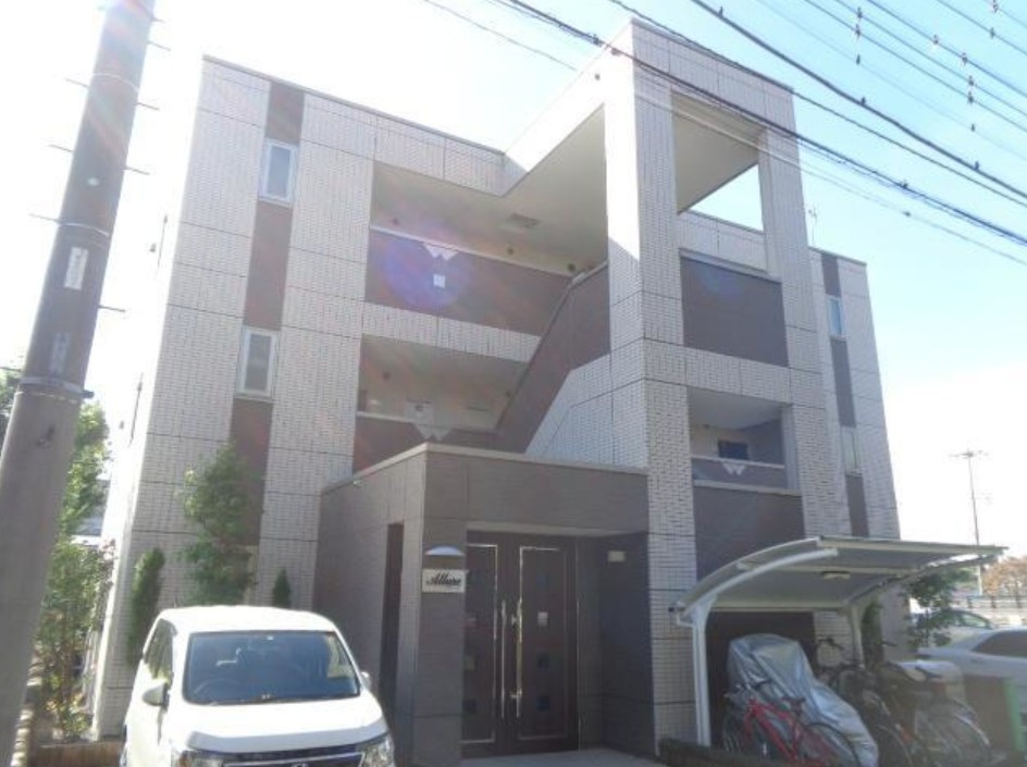 稲城市東長沼の賃貸マンションのエントランス