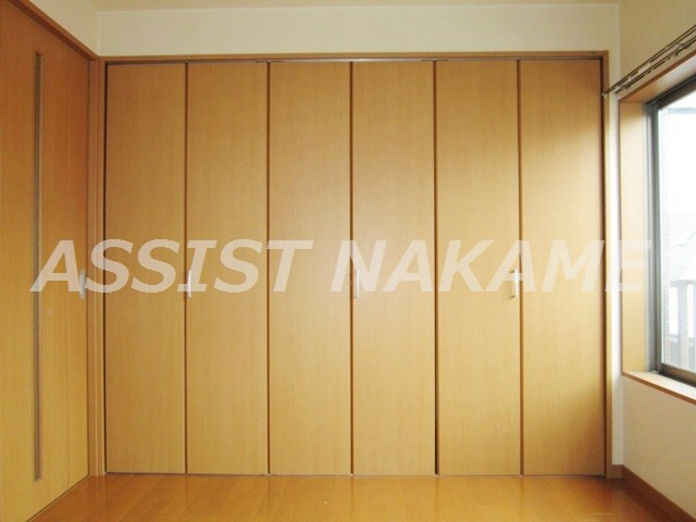 メゾン堀井の寝室