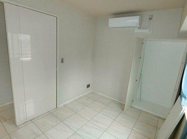 マジェスティハウス新宿御苑パークナードの寝室|こちらは白を基調とした内装