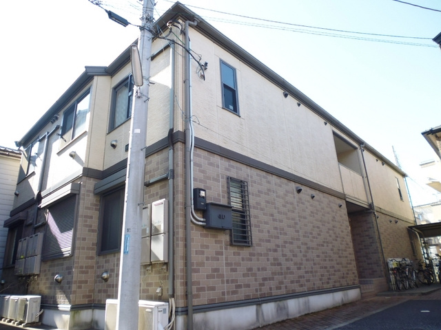 アムール壱番館の外観|レンガ調のオシャレな外壁の建物です。